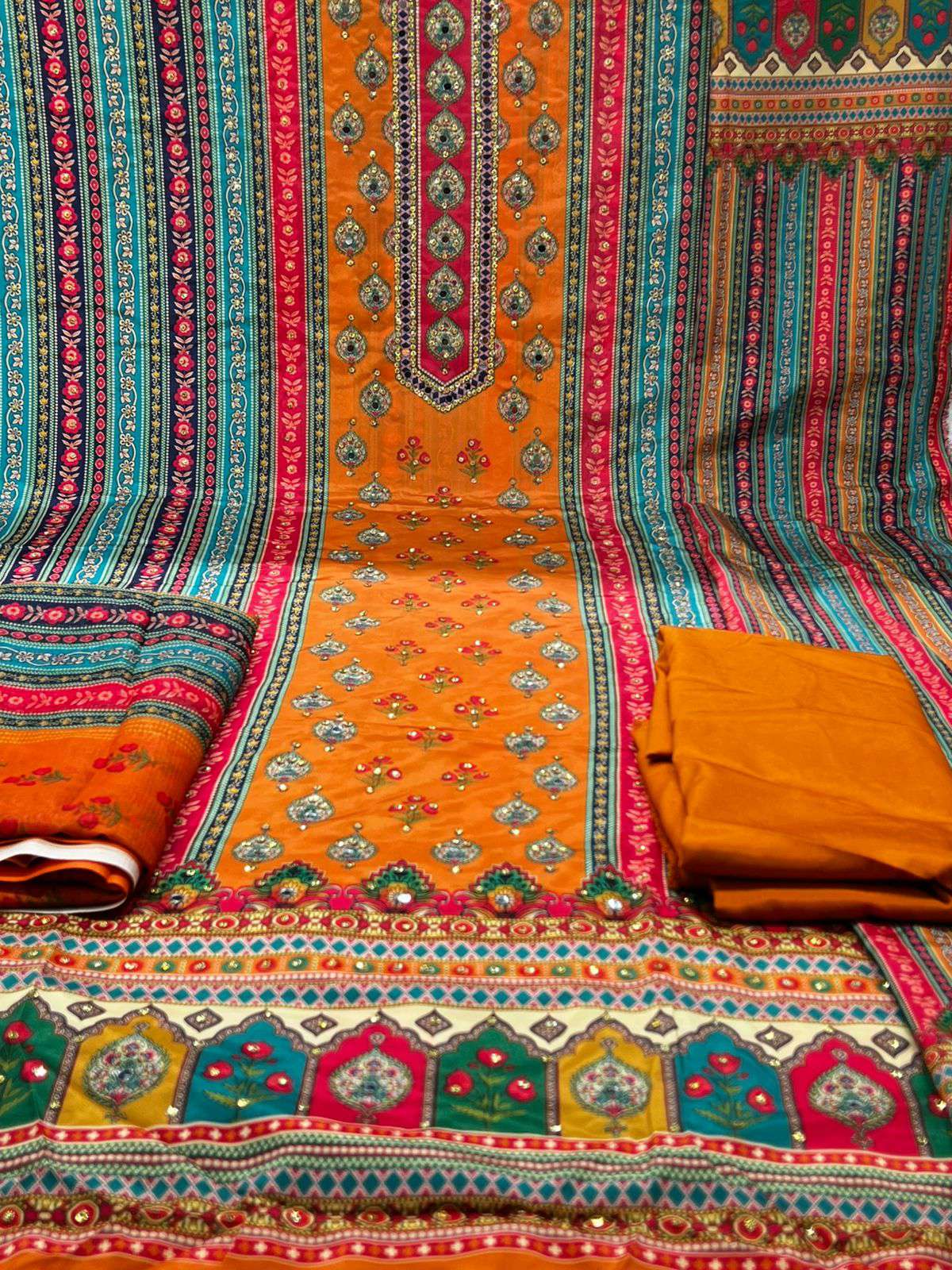 Lahori Silk Orange Party Ware - 1200 .24